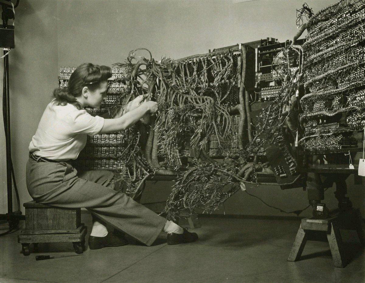 An engineer installing an IBM computer, 1958. #WomenInTech