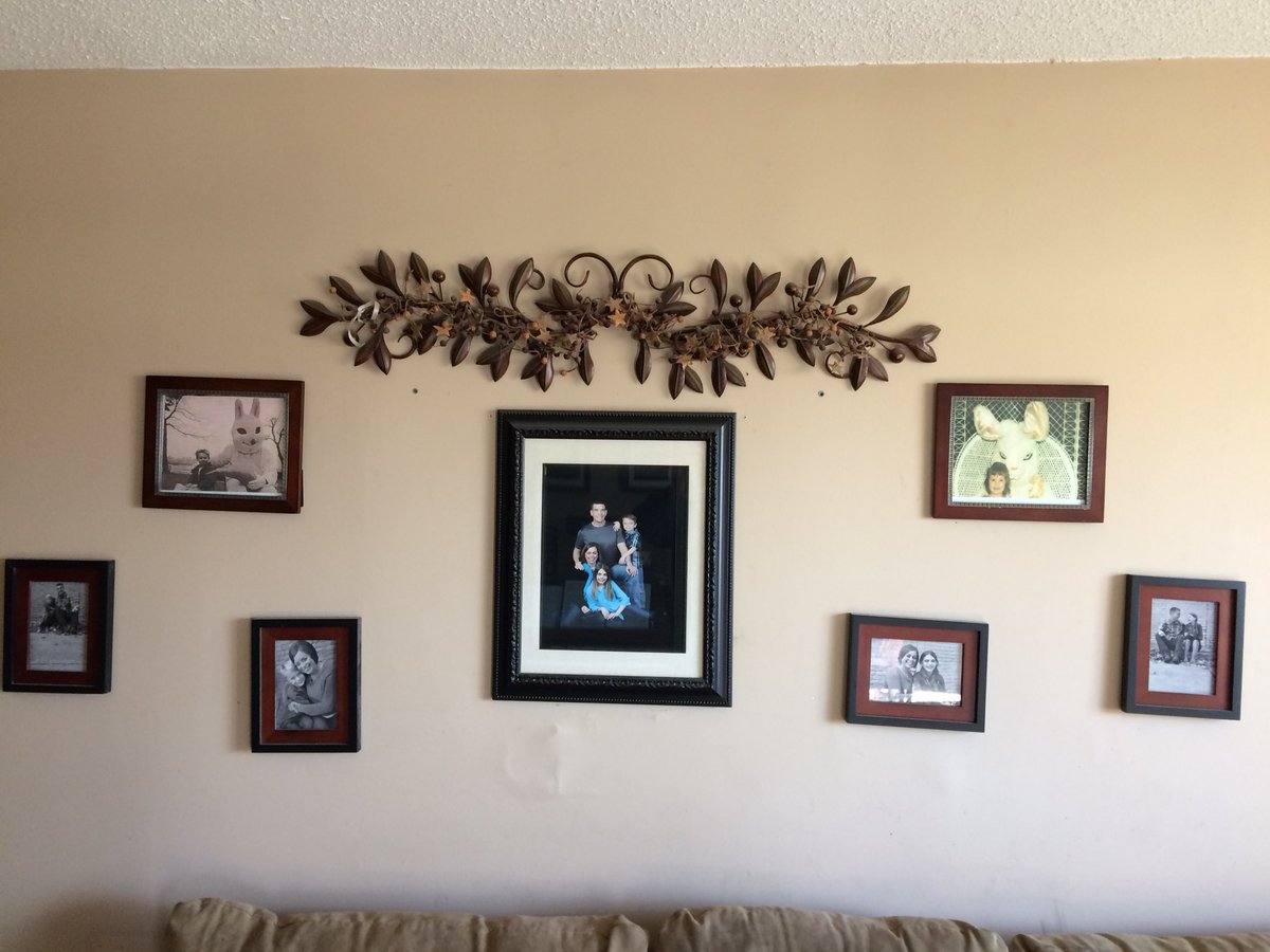 TJradio's tweet image. Swapped out some family photos on the wall at home and nobody has noticed yet. 😉 #EasterFools