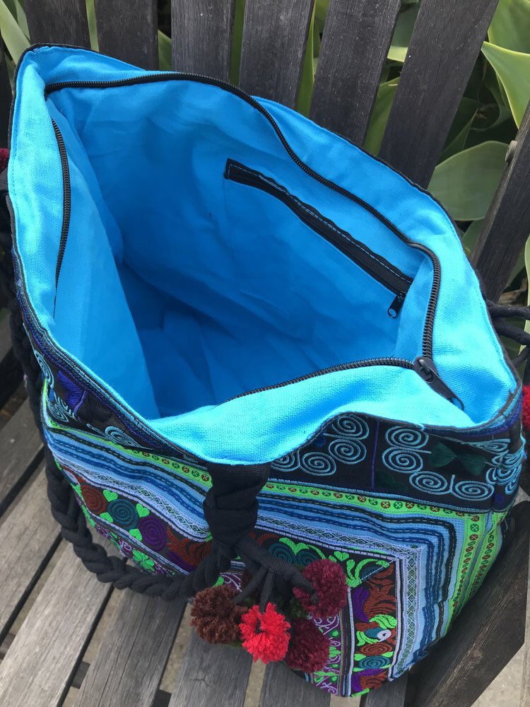 Sandy blue carryall. This #totebag is the perfect size for everyday or #overnight. Shop ninayaya.com #shopsmall #Thailand #madeinThailand #shopnow #embroidery #supportsmallbusiness #womanowned #womenownedbusines #yoga #practice #bekind #kindnessmatters #happyeaster