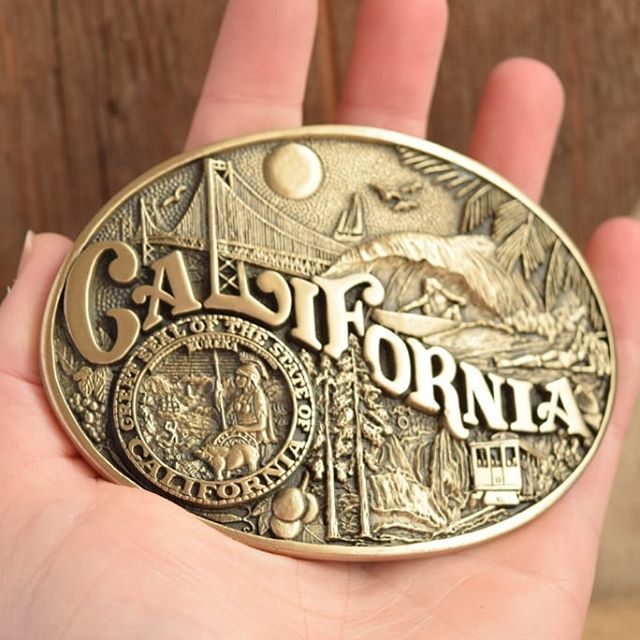 Its snowing today and we're dreaming of California. 
This brass belt buckle says it all... Tag a friend who needs this! .
.
.
.
.
#dreamingofcalifornia #cali #california #vintagebeltbuckle
#beltbuckle #vintage #boss 
#brass #retro #details #madeforthis #… ift.tt/2IoJlk7
