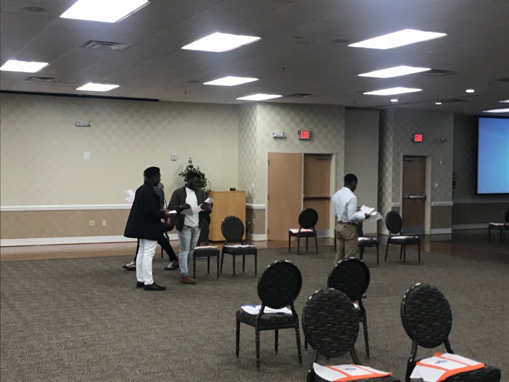Student volunteers helping set up for tomorrow’s Education Career Expo