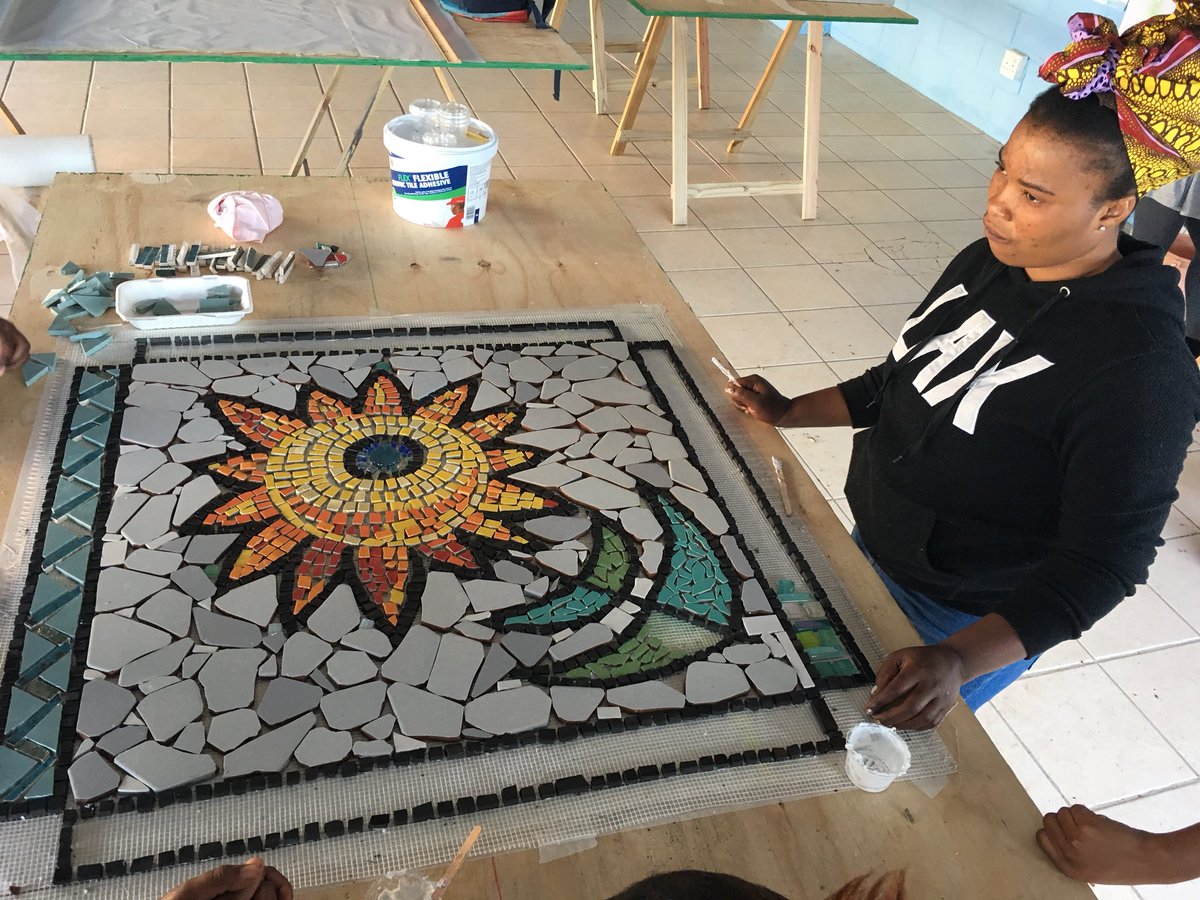 OCEANSMILE4's tweet photo. OCEAN SMILE team learn and make it Mosaic art for community pathway #turkish #school #ATATURK #Southafrica  #township #artteacher #education  #love #kids https://t.co/3A6p8QZtsw