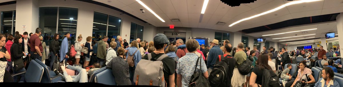 JGroese's tweet photo. Come on @Delta! After 4 hours on tarmac, running out of gas and mechanical issues it’s now 1:30am, we’re all crammed in this little room to reboard and you’re trying to call people up by class? Just let people board normally in this situation and we could already be in the air! https://t.co/EGLS97rx4Z