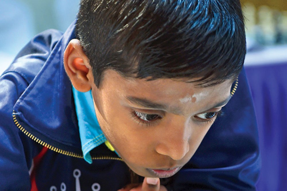 Openthemag's tweet photo. Rameshbabu Praggnanandhaa, 13, Chess Player: His speed and intuition are the highlight of a new, golden era of Indian chess, #10thOpenAnniversaryIssue, #OpenMinds2019, https://t.co/8W8jjO9GE5 https://t.co/ZGv1N1L1x3