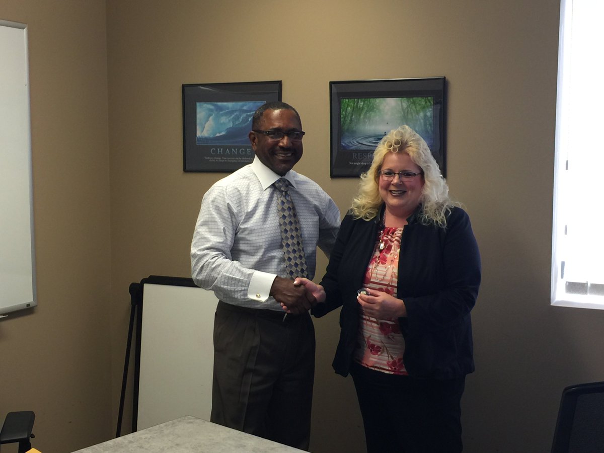 ADD Blakley presents Region Manager Stephanie Musser with a 25-year service pin, and thanks her for her outstanding service!