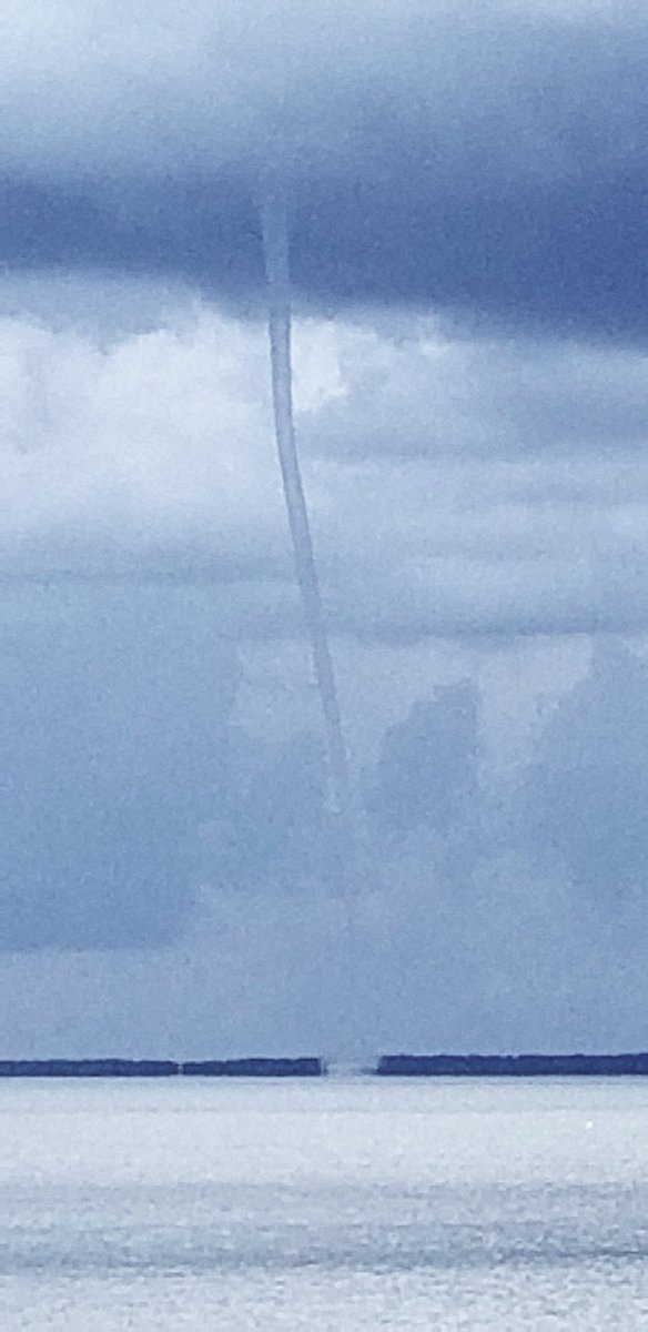 brian_shane's tweet photo. St George Island  #stgeorgeislandfl  water spout in the bay near Apalachicola, FL https://t.co/Rjltd8MraQ