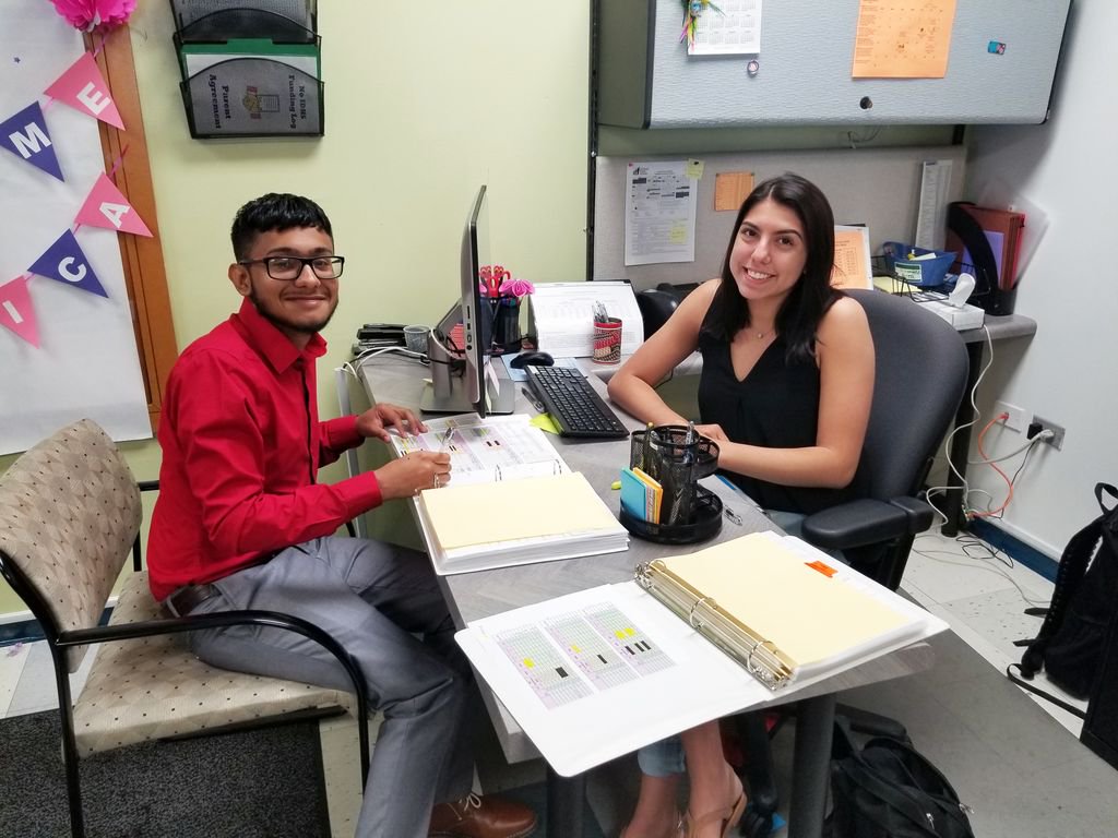 HolyTrinityChi's tweet photo. Cristian Torres '20 and Evelyn Padilla '19 are mid-way through their HT Friends for a Future internship at @eriehouse and say the communication skills they're learning will help in college and beyond. #HTExcellence #HumansofHT https://t.co/FHAeXojMTG