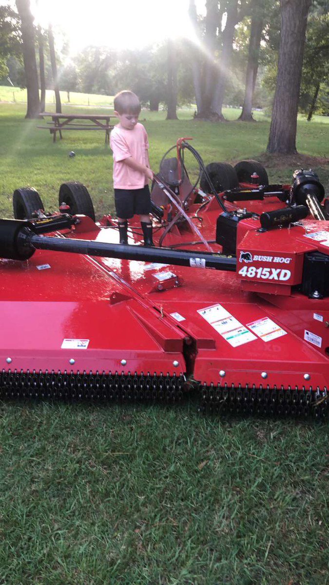 BushHogLLC's tweet image. Precious Brady is helping his Daddy by cleaning his Bush Hog after a day of cutting! Thanks Michael and Blair for the photo! #BushHog #RotaryCutter #FlexWing #4815