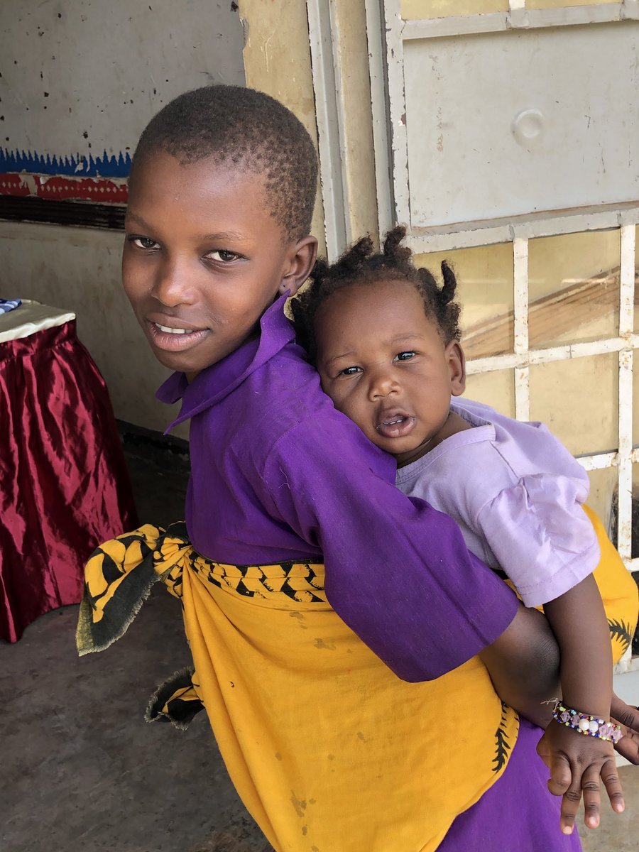 CUganda2019's tweet photo. Some of the participants bring their children to the college. The older children take care of the younger for a majority of the day. @albertateachers #CTFPO #projectoverseas #united4ed #UNATU @ETFOeducators @NWTTA https://t.co/Zp9FUqBw3v