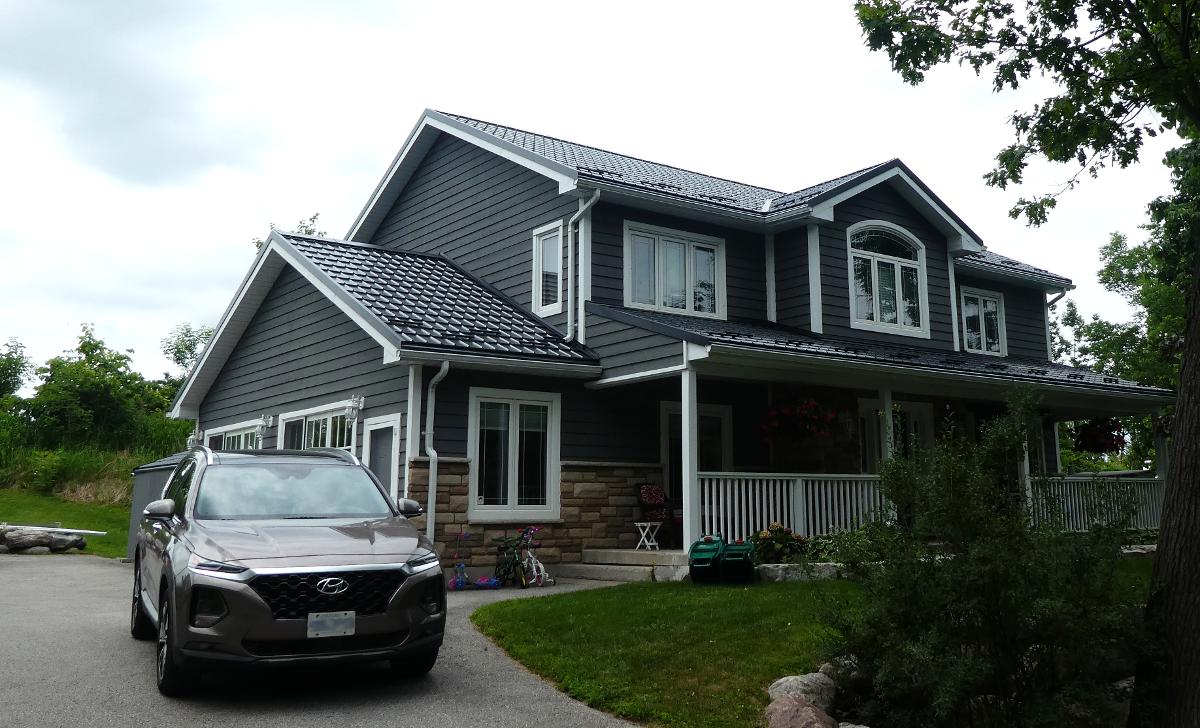 HyGradeRoofing's tweet photo. #InstallationoftheWeek winner is Tim and crew!! Great work on this Slate Grey Hy-Grade Steel Roofing System in Severn, ON! These homeowners are worry-free when it comes to their roof for at least the next 50 years! #steelroof #newroof https://t.co/q7kRWOHXtk