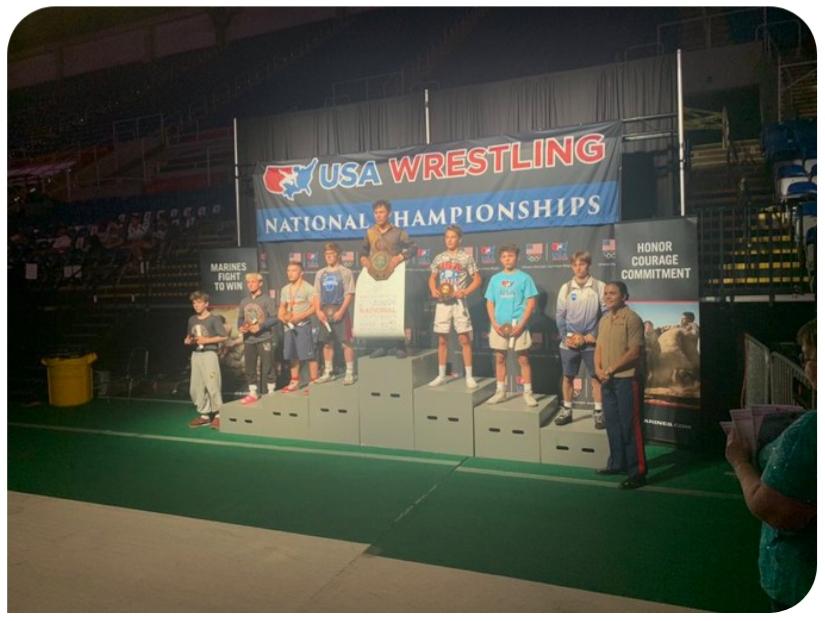 Here are a couple of photos of Billy Sullivan, the podium and with his coaches. Awesome job Billy!