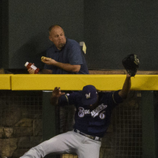 JRRadcliffe's tweet photo. Have we talked about the dude saving his hot dog behind Cain's great catch last night? Heads up awareness. https://t.co/qK1BRuStqF