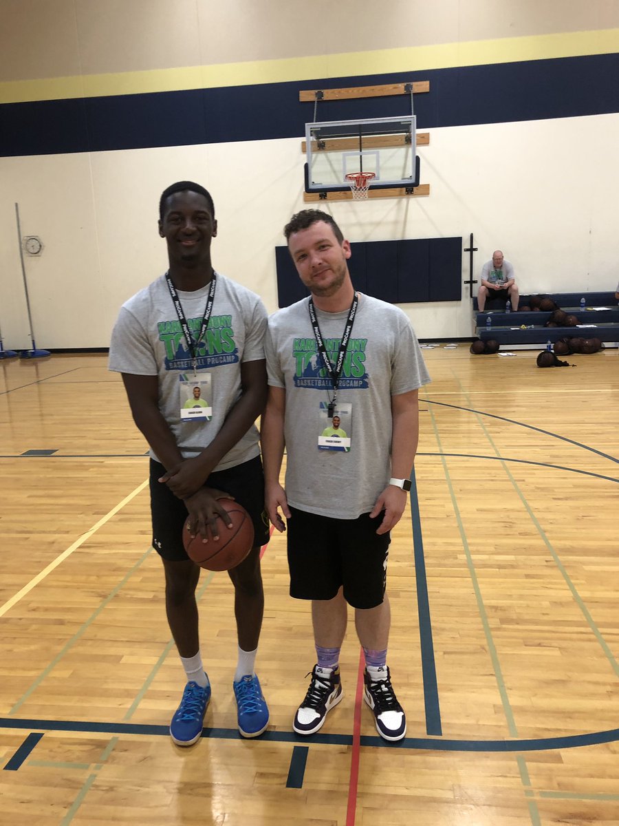 BSM_Basketball's tweet photo. Check it out! 2018 Alum and @OLEFOOTBALL WR Gabe Alada helping @CoachBill_BSM at the @KarlTowns ProCamp! Gabe enjoyed the youth camps at BSM, and is now helping young @Timberwolves Fans improve their game! #BSMHoops @bsmredknights https://t.co/QkZGe1che1