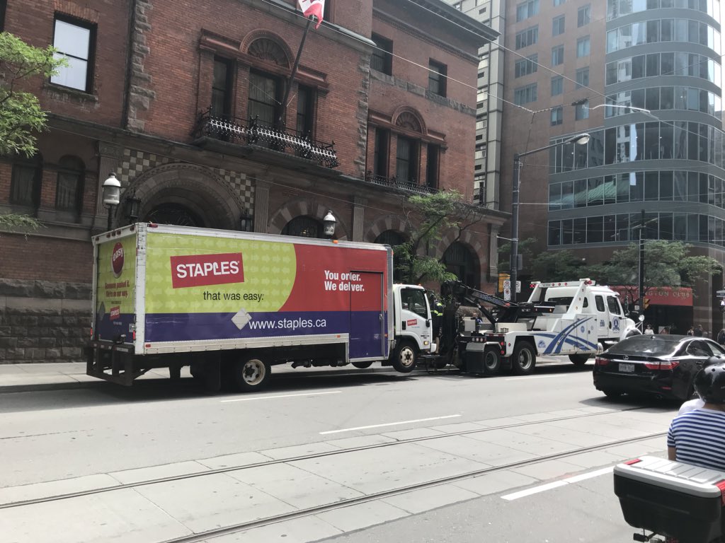 ParkingTPS's tweet photo. This @StaplesCanada truck was caught on Wellington St W #RHR the driver was extremely annoyed saying that he does this all the time and only gets tickets #TagAndTow Rush hour routes are not for deliveries #KeepTOMoving ^sk https://t.co/fwSxPSkrfa