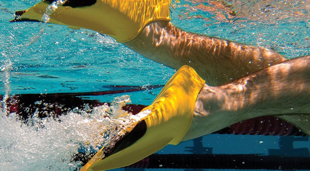 When learning freestyle, it’s helpful if you’re moving through the water. Fins can be invaluable for that purpose, especially in the beginning.
