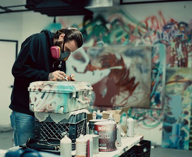 _owlbot's tweet photo. @chaselock is painting at the @amazon booth at @comic_con tonight at 7pm. If you're in town cruise by! Seen here painting an #OWLBOT Pelican Case.
🎞️ @cinestillfilm #800T
📸 #Mamiya #RZ67proII https://t.co/8OniLNaigA https://t.co/tmJrgZpGto