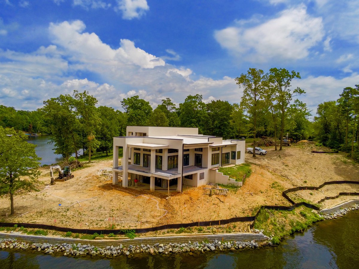 ConsultingHope's tweet photo. Beautiful modern house by Hill Development on Lake Hamilton. Are you looking for a land surveying company that can do it all?  We are FAA certified for small unmanned aircraft. We have everything under one roof, inquire now. https://t.co/QiOtLZI2Ic