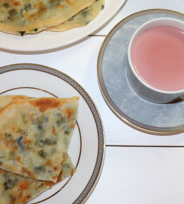 Afghani Bolani Made From Leeks. Bolani is an Afghani appetizer. It is thin flat bread stuffed with leeks and pan fried until golden brown and crispy.  It is so incredibly tasty, but yet so under the radar. For full recipe check royatoday.com #afghanfood