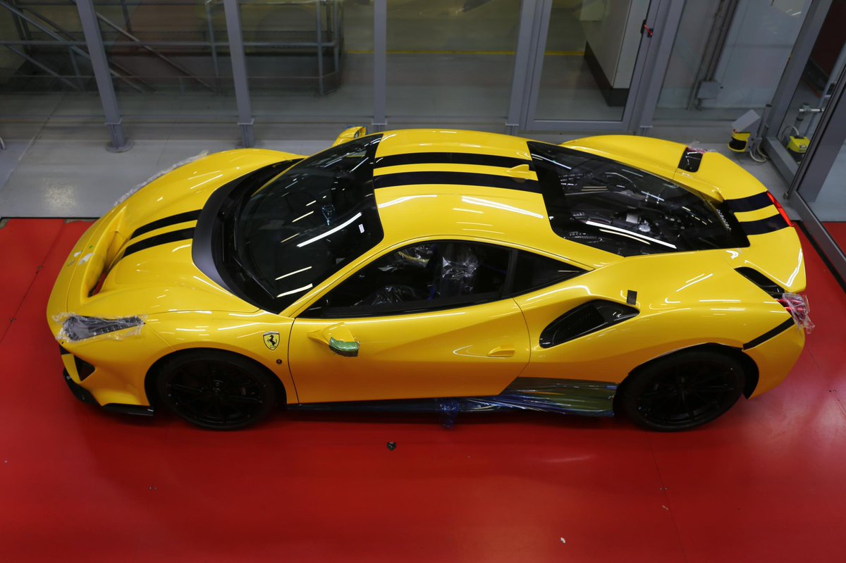 Production line photo of my 488 Pista -  not long now 😀.  Stripe colour is actually Blu America but lighting makes it look black.