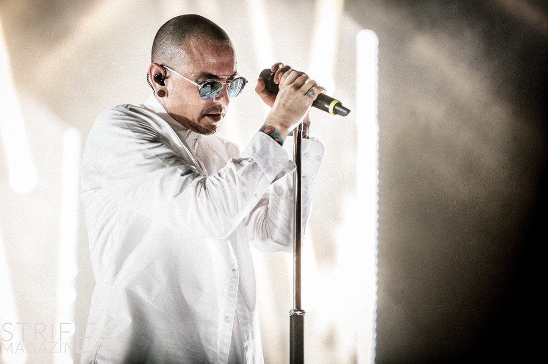 LPLive's tweet photo. Two years ago today we lost the legendary Chester Bennington. 

We reflect today on the times that he made us smile; we look back and are grateful for his music, his kind heart, and his generosity.

Chester was an incredible singer, and a wonderful person to us all. We miss him. https://t.co/qJGcSEs9IP