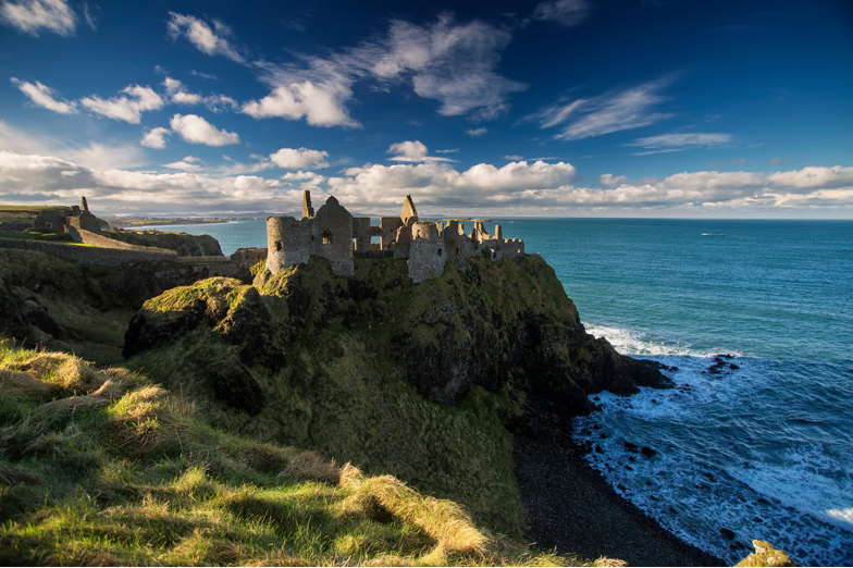 If you're in Portrush to witness the 148th Open, how about visiting some sites along the Causeway Coastal Route? 
📍Dunluce Castle, Co Antrim
👉ow.ly/hsb750uVGfz