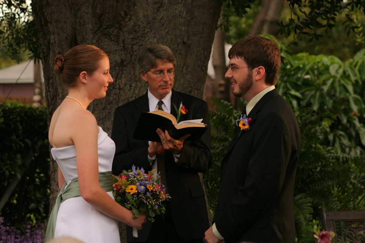 Nev and I started our relationship the first year of college; teenagers! We married young too, and have been married for 13 years.(That's my dad officiating; we got married in my childhood back yard)