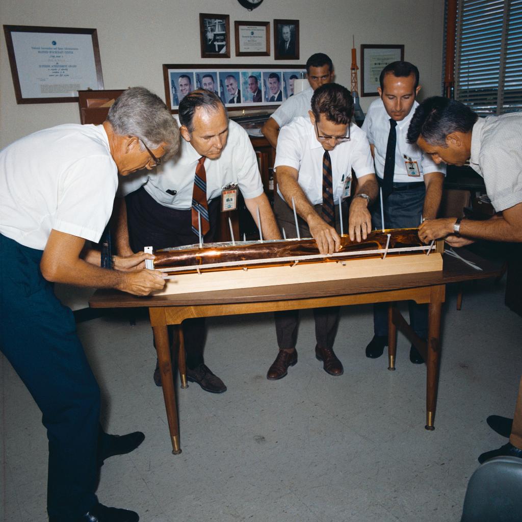 NASAhistory's tweet photo. Before we could plant the Flag, we had to pack it. The 12-step packing procedure required 5 people to ensure that the flag was secure in thermal packaging. The flag was then placed on the left side of the ladder of the Eagle, ready for #Moonwalking

#Apollo50th #Apollo11at50 https://t.co/CJXf7r85xW