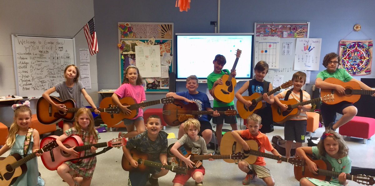 WESWorldLang's tweet photo. Guitar lessons this week rocked! @FTSchools @WES @MES @JES https://t.co/djPMPy14Mz