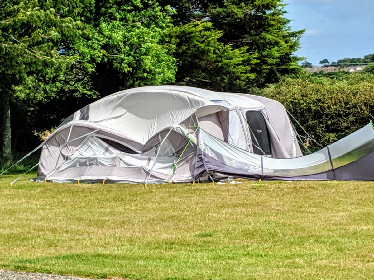 This is a tent just across from us. The occupants were up till dawn talking and playing music (thankfully most of the night the rain drowned them out) and have spent the day asleep while their tent gradually collapses round them. Interesting approach to camping.