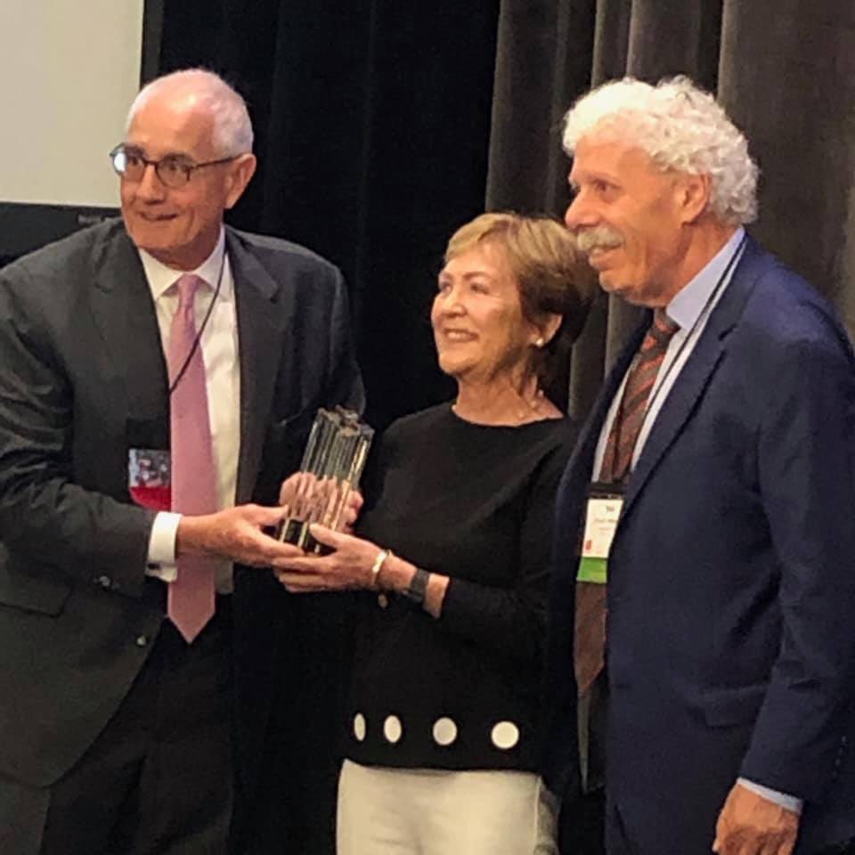 Casey Long receiving the Richard Boyette Award on behalf of her late husband, and former <a href="/DRICommunity/">DRI | Association of Lawyers Defending Business</a> President, Patrick Long at the #NFJE Symposium in Chicago.