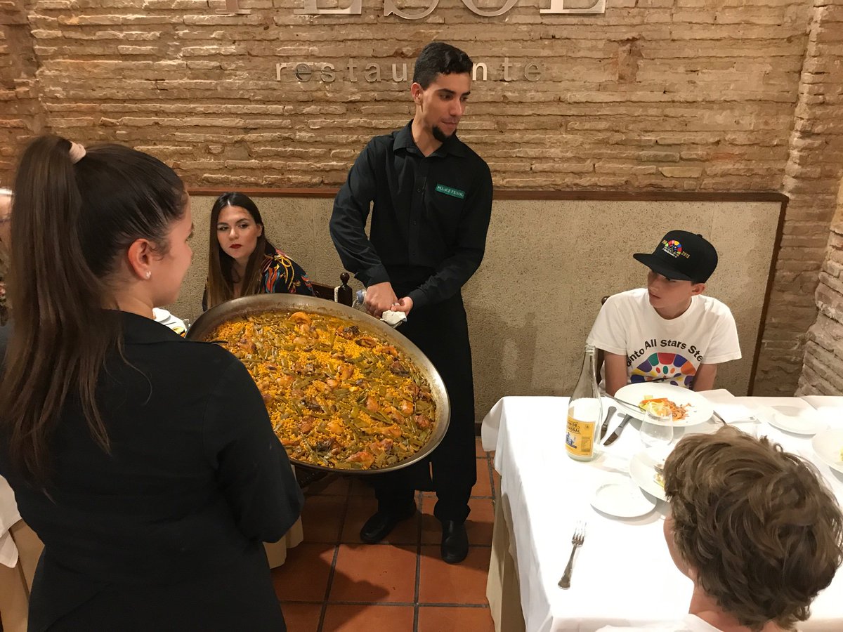torontoallstars's tweet photo. .@torontoallstars in Spain, Valencia - El Pal del Remei - enjoying a Spanish delicacy - Paella. @Deirdre_Kelly @AirCanada @spain @ValenciaCity @RtePalaceFesol @costablacaorg #TASSOSteelPan #Valencia #VisitSpain #Toronto #HEATWAVE2019 #TeachSomethingIn5Words #Europe https://t.co/QLXXc3zcK2