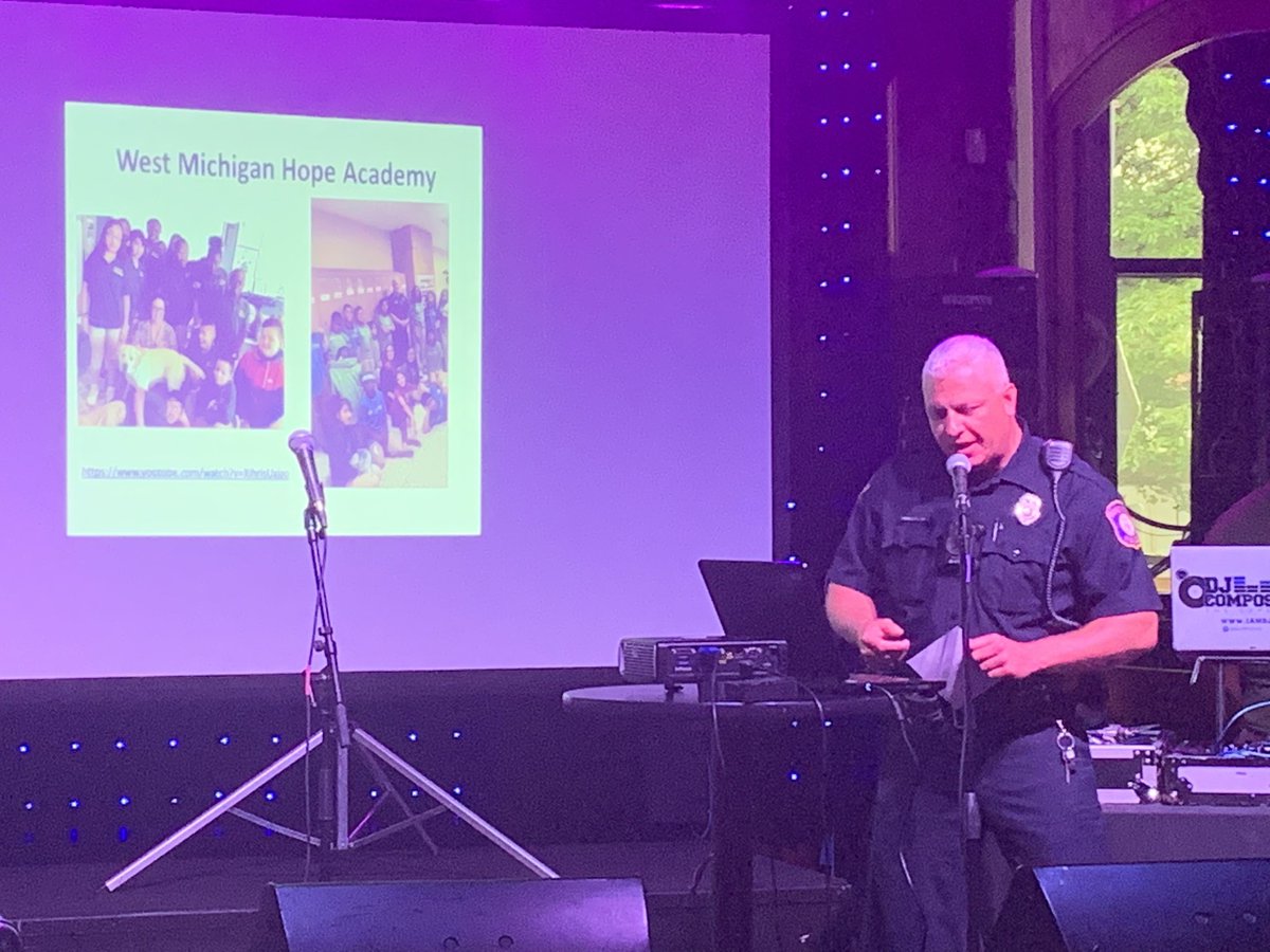 GrandRapidsPD's tweet photo. Ofc. Brian Grooms at the #GRsummerproject Talent Showcase tonight at The B.O.B. honoring youth leaders and musical artists in GR. Proud of Hope Academy of W. MI. and their student leaders. @MyMagicGR #FindYourPositive #YoungLeadersInAction #ProjectsForPurposeMI https://t.co/92HJFCZStK