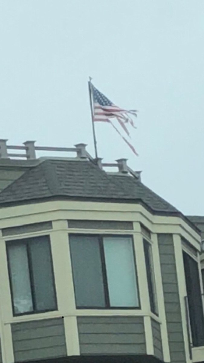 SFsomaGirl's tweet image. The tattered state of this American Flag atop Trinity's Marina Cove Apartments at 1550 Bay St., SF, CA, was such a shocking sight that I couldn't help wonder if it's intentional.  @FlagShaming