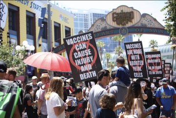 V for Vaccine Damage Protest at Comic-Con 2019 D_9cYKNWkAAB4Ge?format=jpg&name=360x360