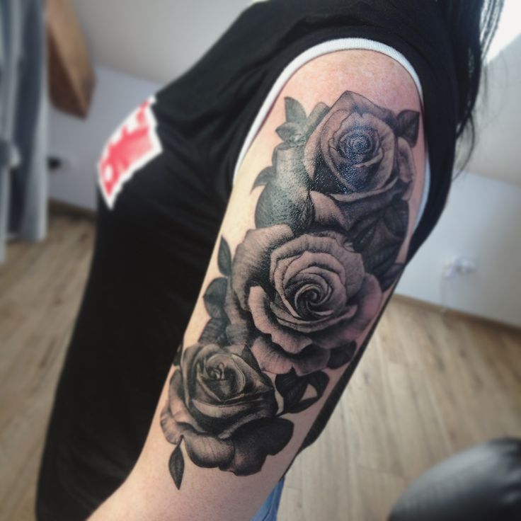 Grey Ink Rose Tattoo On Right Arm