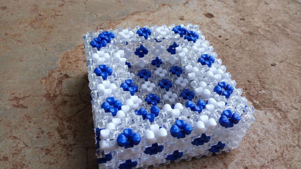 jorgesmacharia's tweet photo. Serviette holder: made of beads for ksh.1500. You will love it. https://t.co/FxuLDwYNtn