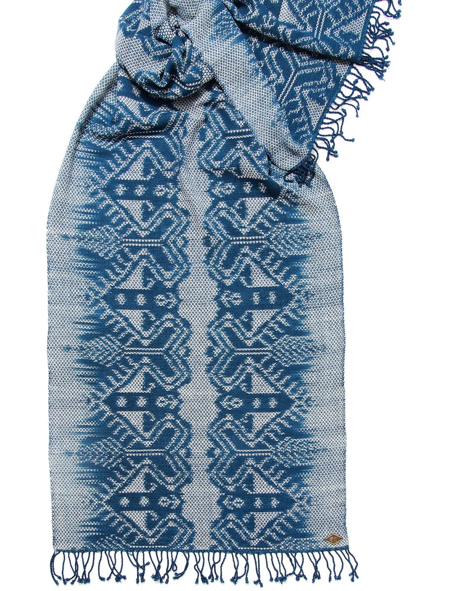 Indigo_People's tweet photo. The Crown scarf,handwoven following the traditional ikat technique and natural indigo dyed. It takes our artisan seven days to create this scarf, from spinning through tying, dyeing and handlooming. Will be in the stores soon! 
.
.
#indigopeople #izomepeople  #rawnatureofblue https://t.co/sTuTMPbyGF