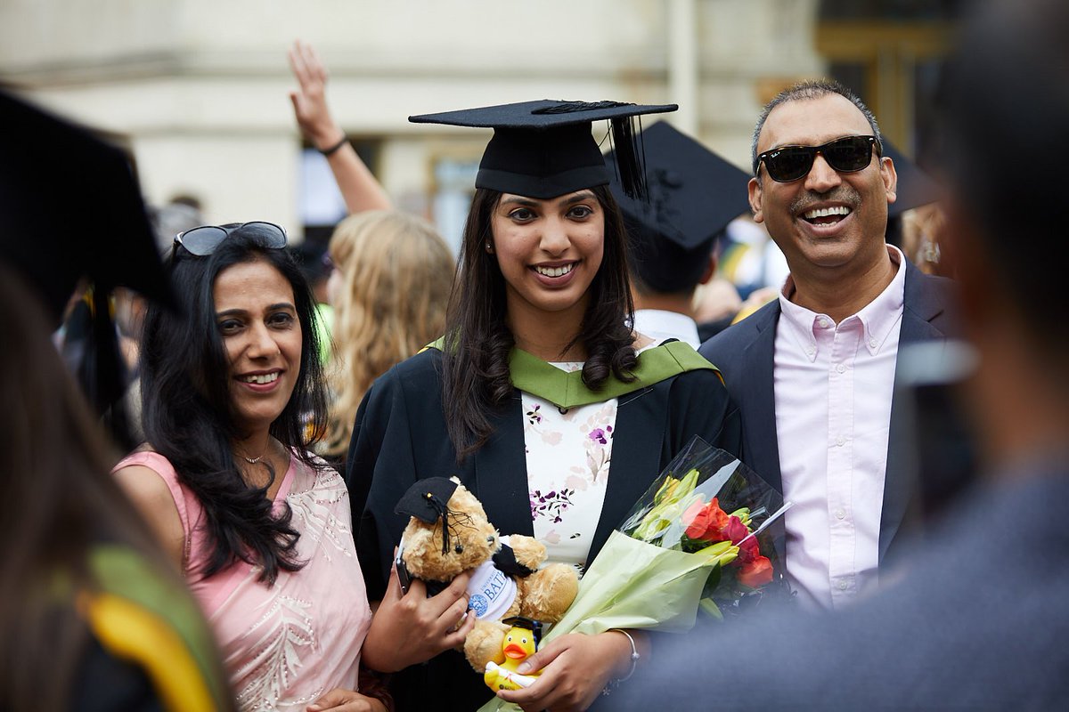 UniofBath's tweet photo. A day for big smiles and hugs at @TheatreRBath. 💙💛 

#BathGrads https://t.co/Zhx3GiH1dI