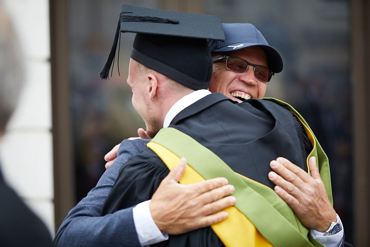 UniofBath's tweet photo. A day for big smiles and hugs at @TheatreRBath. 💙💛 

#BathGrads https://t.co/Zhx3GiH1dI