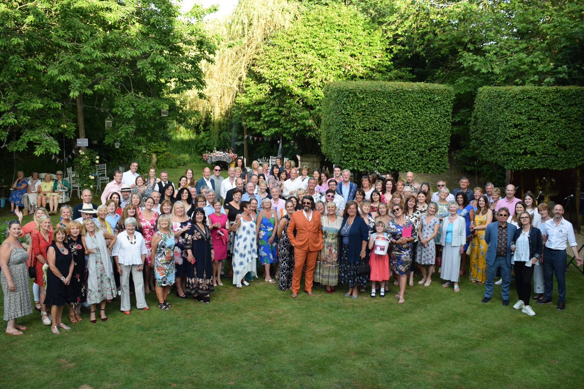 Beautiful group photo of guests at our Glamorous Garden Party, courtesy of Cheryl Miller ARPS.