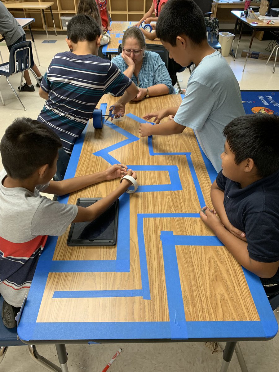 meg_griffis's tweet photo. We had some spare time so we instituted an “Ozobot Challenge.” Make a maze for your Ozobot to get from one end of the table to the other and code it on the iPad! #ozoblockly @CollierScience @collierschools @Ozobot #STEAM https://t.co/oXFzKKs15C