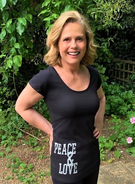 LiveTwiceOrg's tweet photo. We snapped Liz on the way to her yoga class in one of our super comfy 'Peace and Love' organic cotton t-shirts!  Made slightly fitted and longer in length than the average so perfect for exercise - available exclusively @LiveTwiceOrg and only £15.95! #LizEarleMe #Yoga #organic https://t.co/S8Cb5l9apG