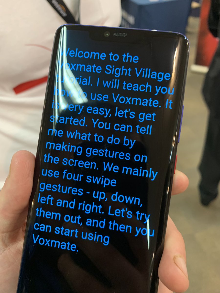 Image of a smartphone using the beta app showing how to use the app with instructions on screen for gestures.