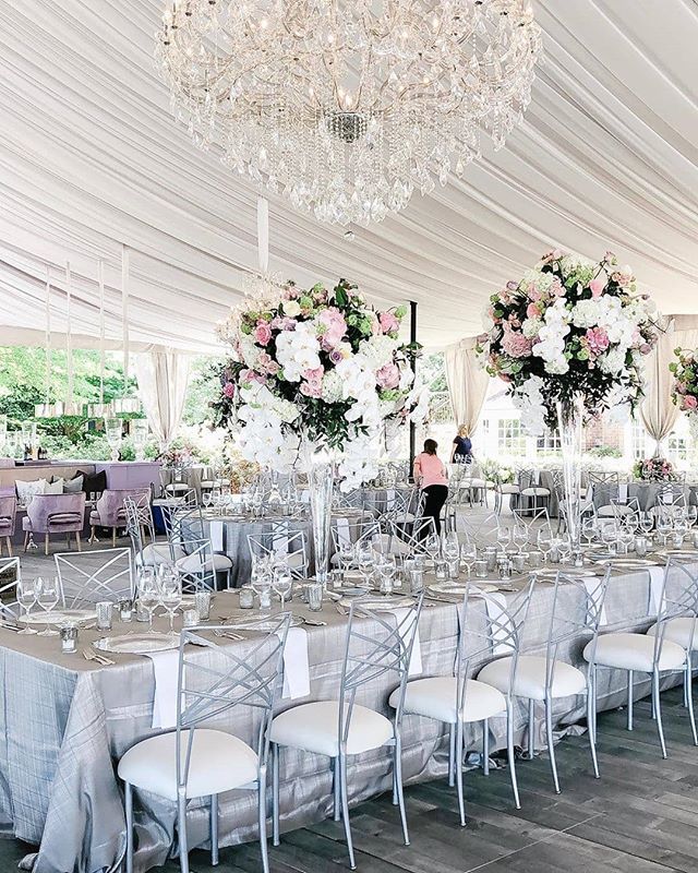 A grand display for one couple's wedding reception. #RaycePRclient @chameleonchaircollection. Regram: @ivyrobinsonevents

Guest Seating: @chameleonchaircollection | Planner: @ivyrobinsonevents | Rentals: @ce_rental @partyreflections | Videographer: @heartstonefilms | Floral …