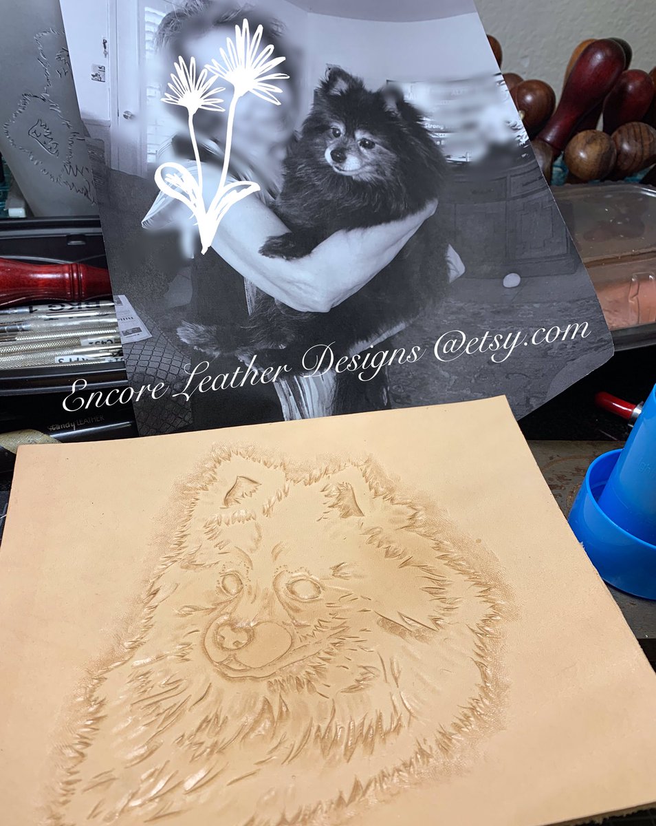 EncoreLeather's tweet photo. A memorial pet portrait is on the bench at our shop. Love doing these because they are so meaningful. We love making things out of leather. By hand. #petportrait #doglovers #leathercarving #EncoreLeatherDesigns #etsyshop #etsysellers https://t.co/2jphQgKZBf