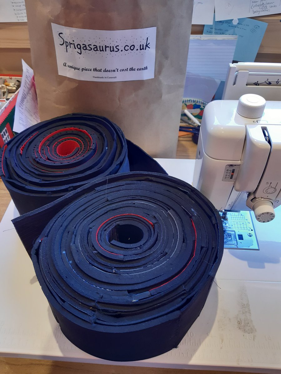 Sprigasaurus's tweet photo. Glue &amp; stitch &amp; glue &amp; stitch. 
Prepping rolls of black neoprene for seat edging.  Fun fun fun!

#Factory #waste #neoprene #wetsuits not going to waste. 

#busproject #repurposed #nowaste #reusereducerecycle  #upcycledtextiles #houseofup https://t.co/wqo7U5v056