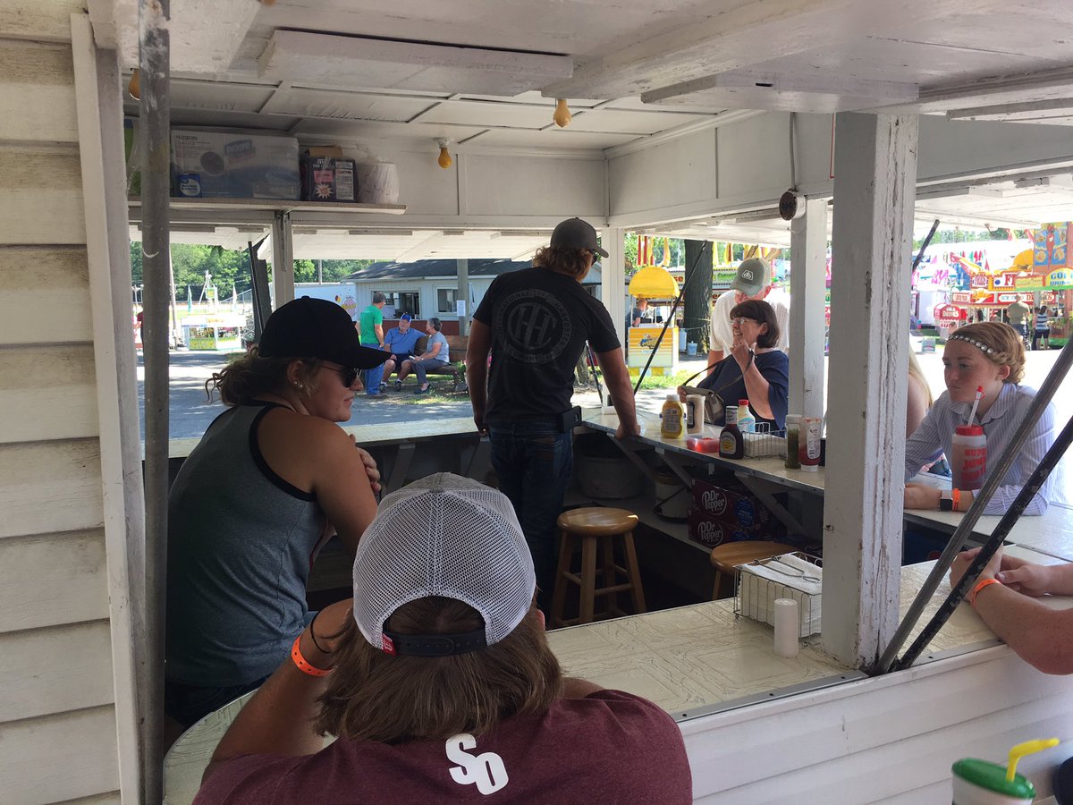 BenloganFFA's tweet photo. FFA students busy at the Logan County Fair today working shifts at the Pork and Lamb Booth, as well as the Dairy Trailer. Living to Serve! https://t.co/mWg7HytDj2