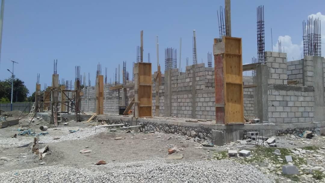 third_lens's tweet photo. A quick update from Neply: 
Despite some of the recent volatility in Haiti, we are pleased to say that progress continues on the @mylifespeaks project. Construction crews just finished the second week of building the walls and septic system. 

Design: @BrrAtlanta &amp; Lecraw Eng. https://t.co/8mzlbbWWS8
