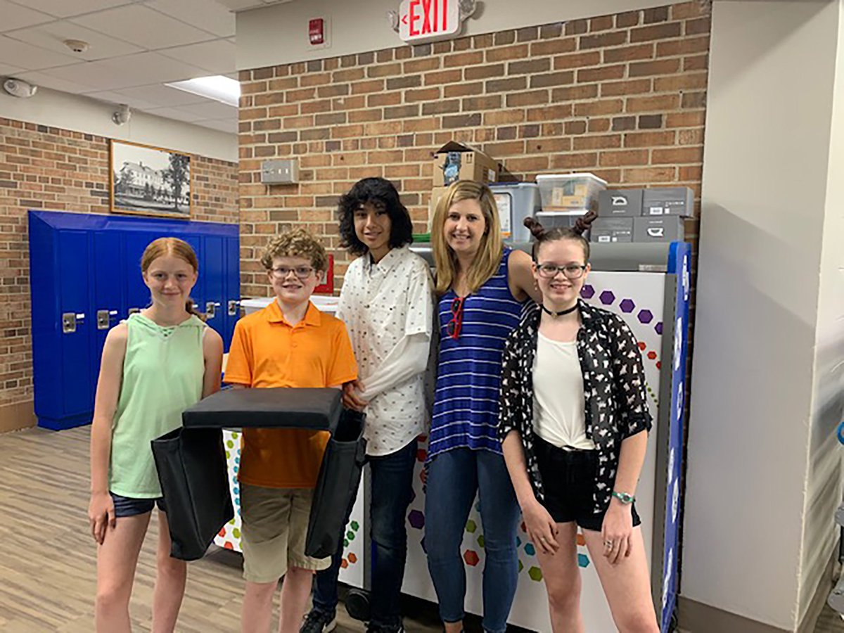 TonkaSchools's tweet photo. #MinnetonkaMiddleSchoolEast Student Innovation Team  partnered with @GopherSport to create the StorageSaddle™, a sack that hangs off of a student's chair in which students can put school supplies they don't want to have on their desks. 
#tonkaschools #tonkapride #innovation https://t.co/WPr1NDdi3x