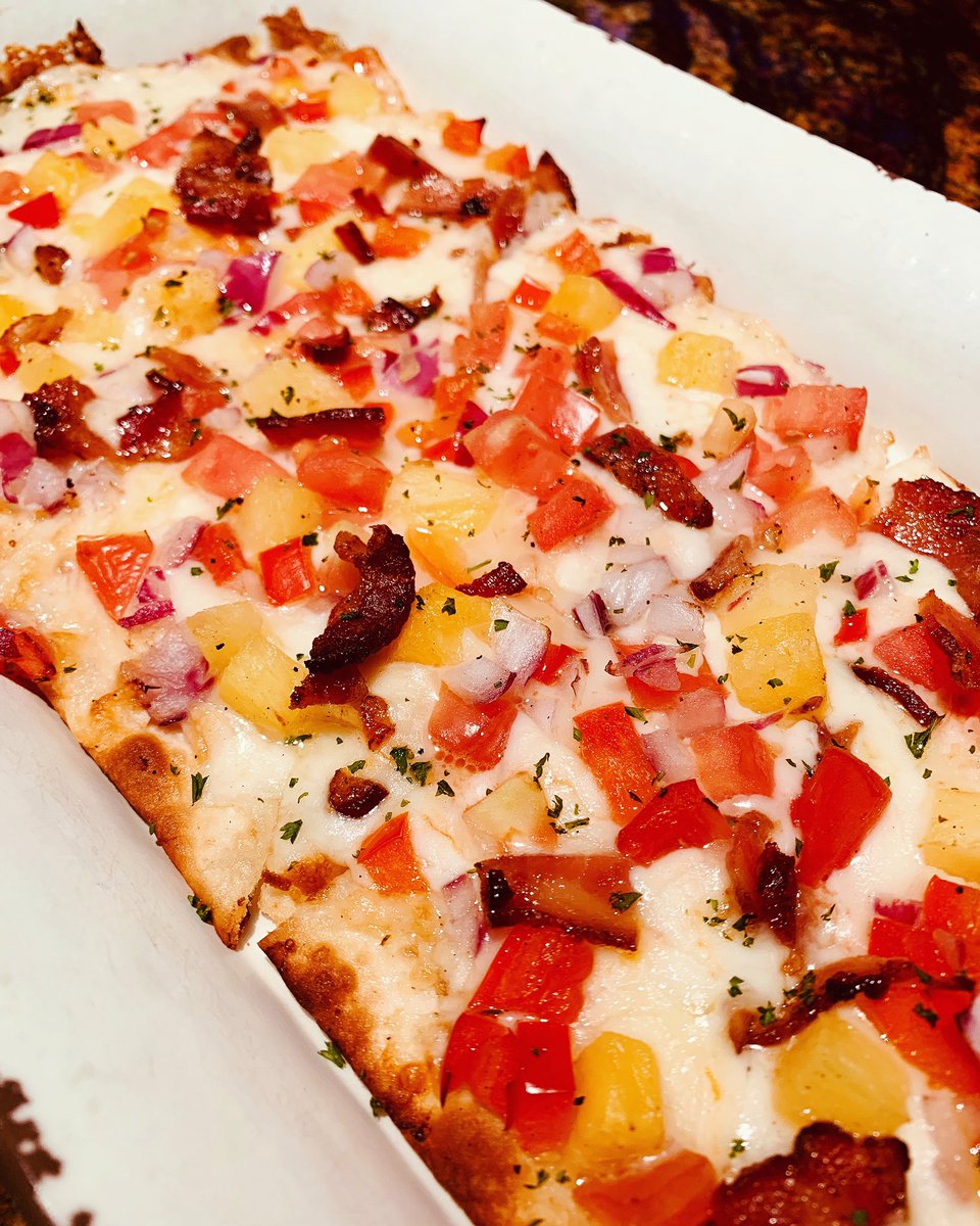 All of our flatbreads are made fresh to order in our scratch kitchen. This is The Dano, named after Dan, our grill cook who invented it. #johnnylukes #wilmingtonnc #portcityfoodies #ilmfood #ilm #scratchkitchen